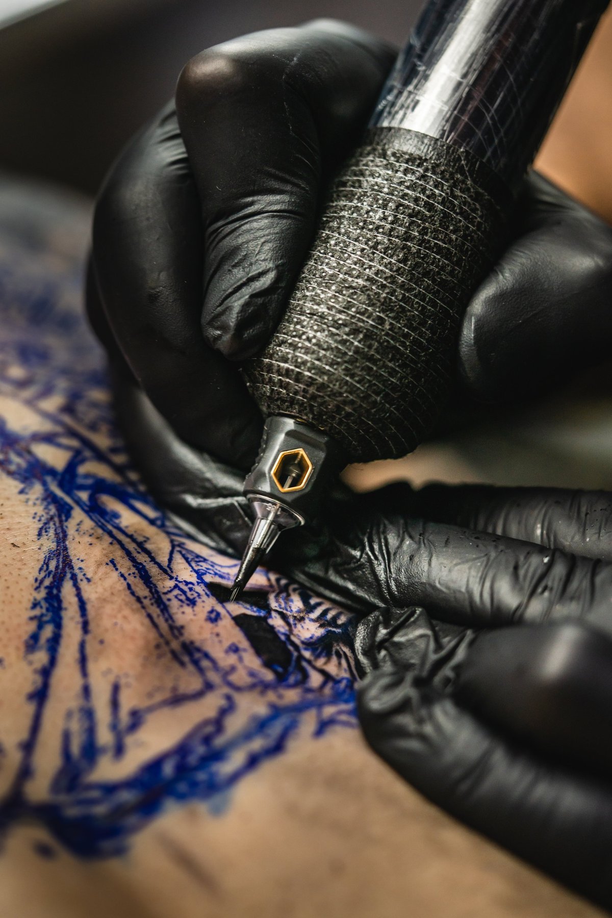 Commercial lease solicitors for tattoo studios advising on tattoo studio premises leases including treatment rooms, hygiene compliant workstations, clinical waste disposal, client waiting areas, and piercing stations for tattoo artists and body art businesses across England and Wales