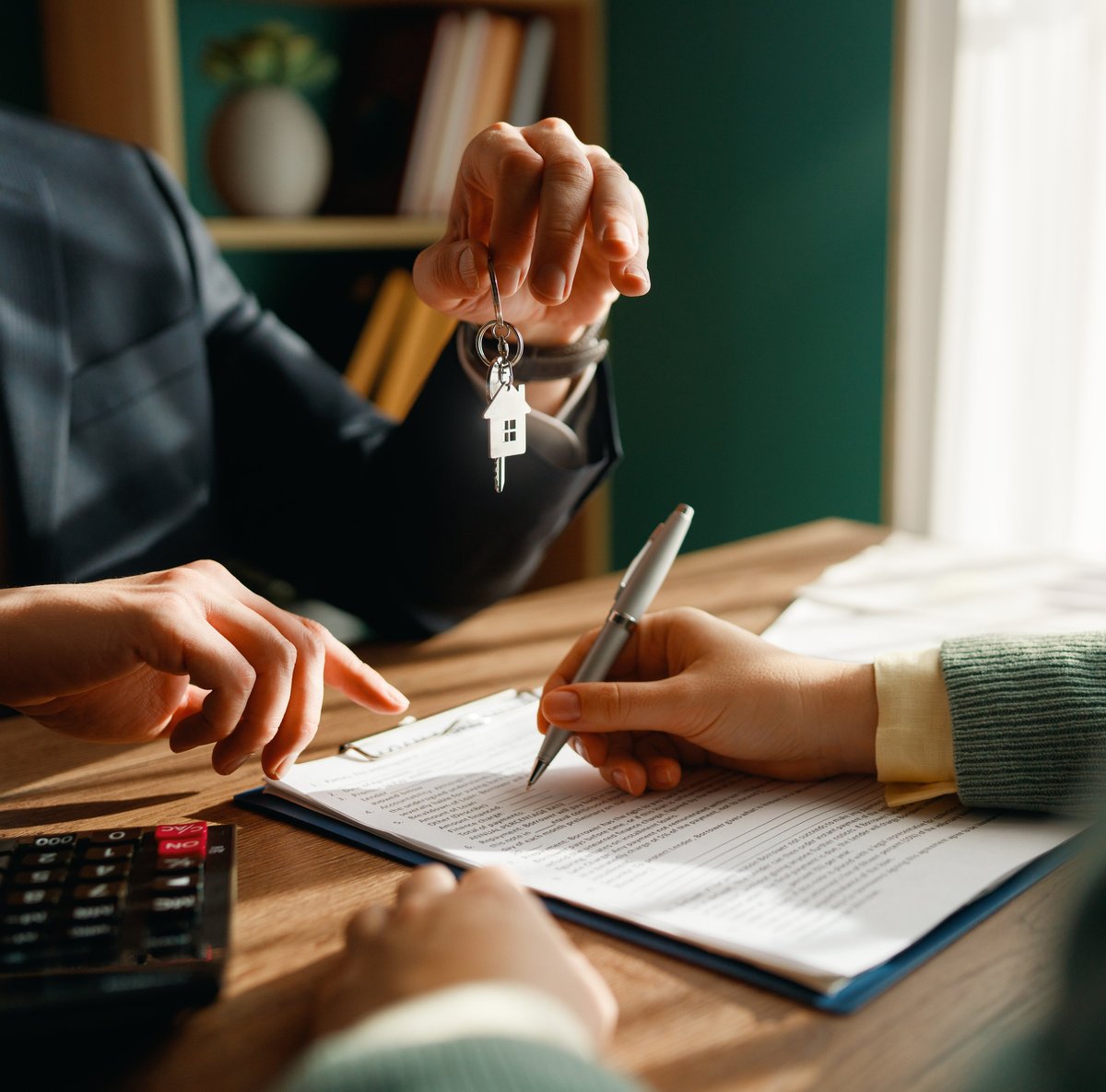 Real estate contract sign. Property mortgage finance signing agreement approved.