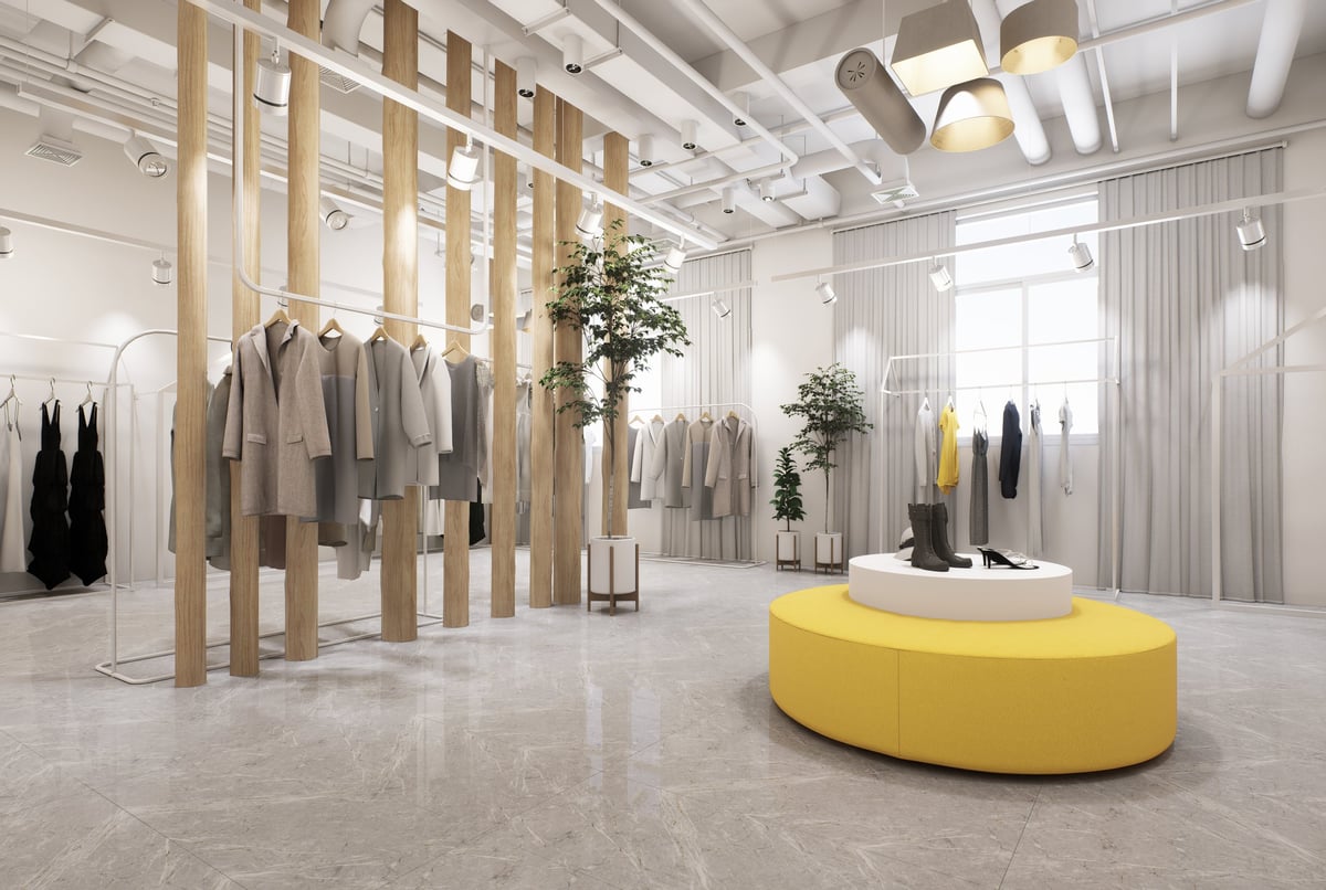 Modern fashion retail store interior with industrial ceilings and natural wood accents