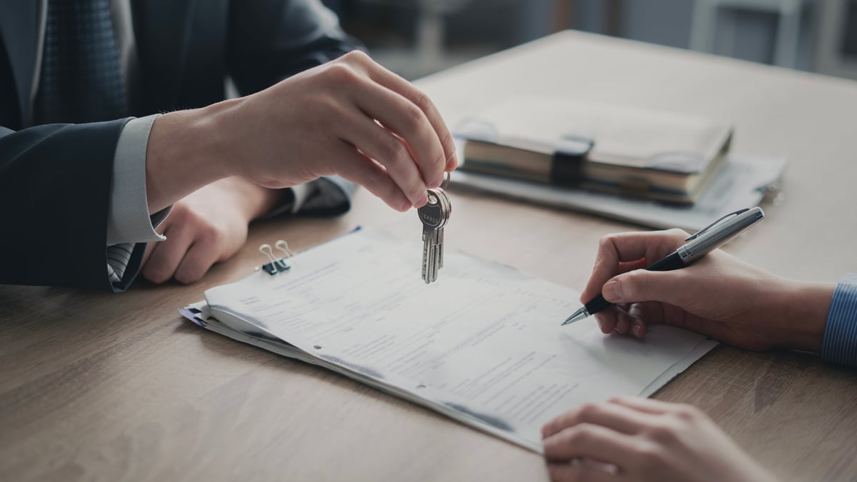 Commercial lease solicitors for national retailers signing retail store lease agreement documents for national retail chain portfolios across England and Wales